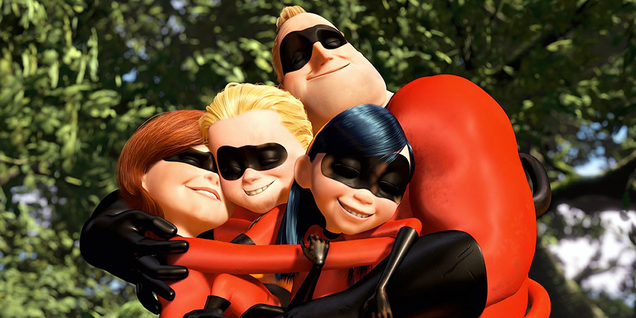 The Incredibles Family Hugging Each Other in Their Costumes After a Battle
