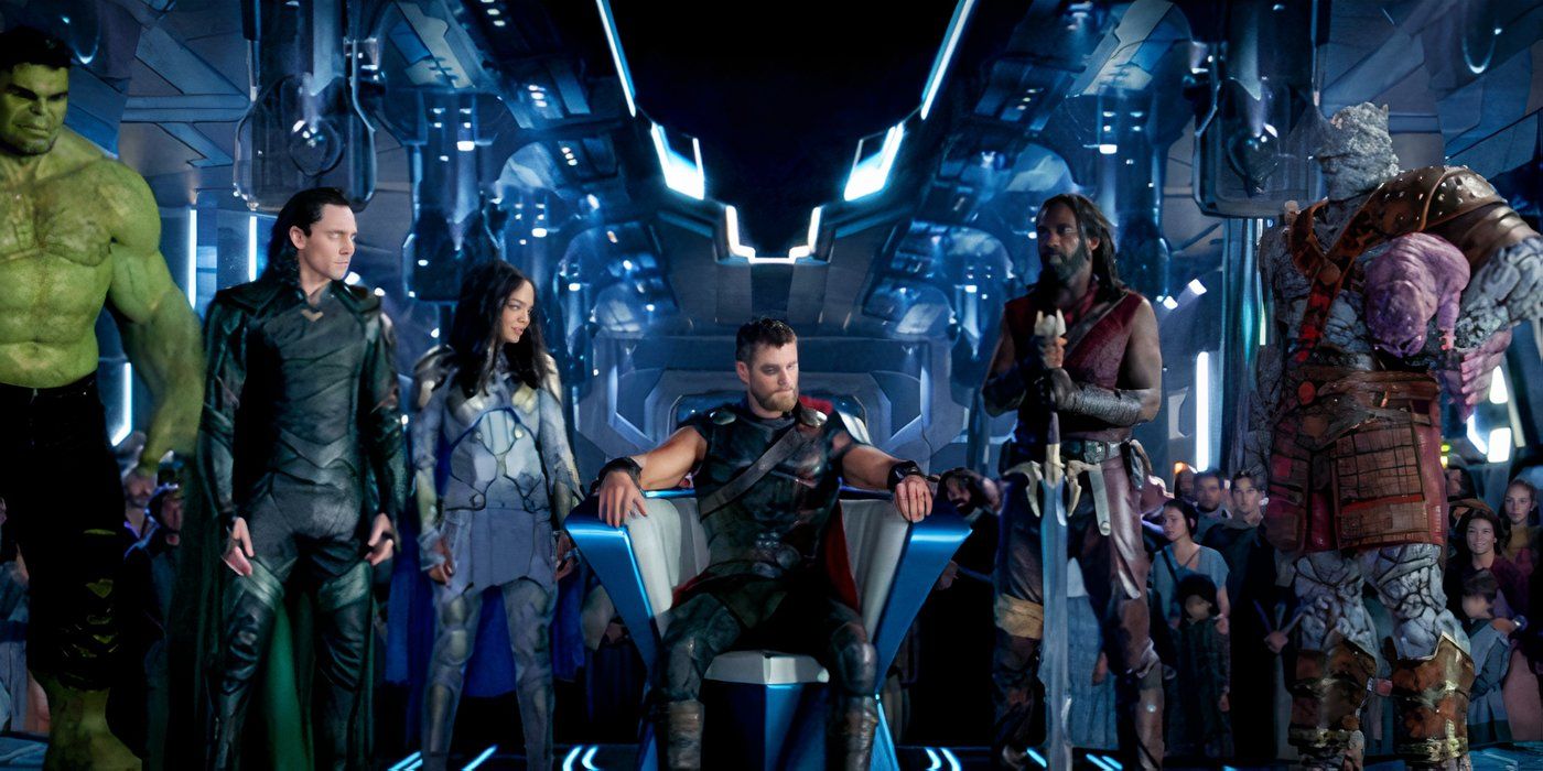 The ending scene from Thor: Ragnarok (2017) showing Thor sitting on his throne with his allies and people behind him