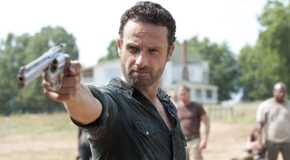 Andrew Lincoln as Rick Grimes pointing a gun in The Walking Dead