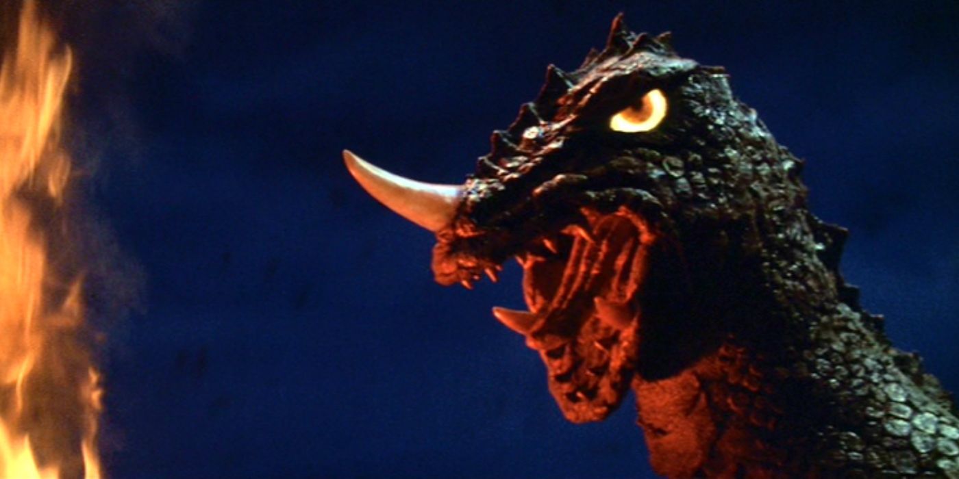 Yongary roars against a dark blue sky