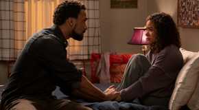 Zion and Ginny sitting on her bed in Ginny & Georgia season 3