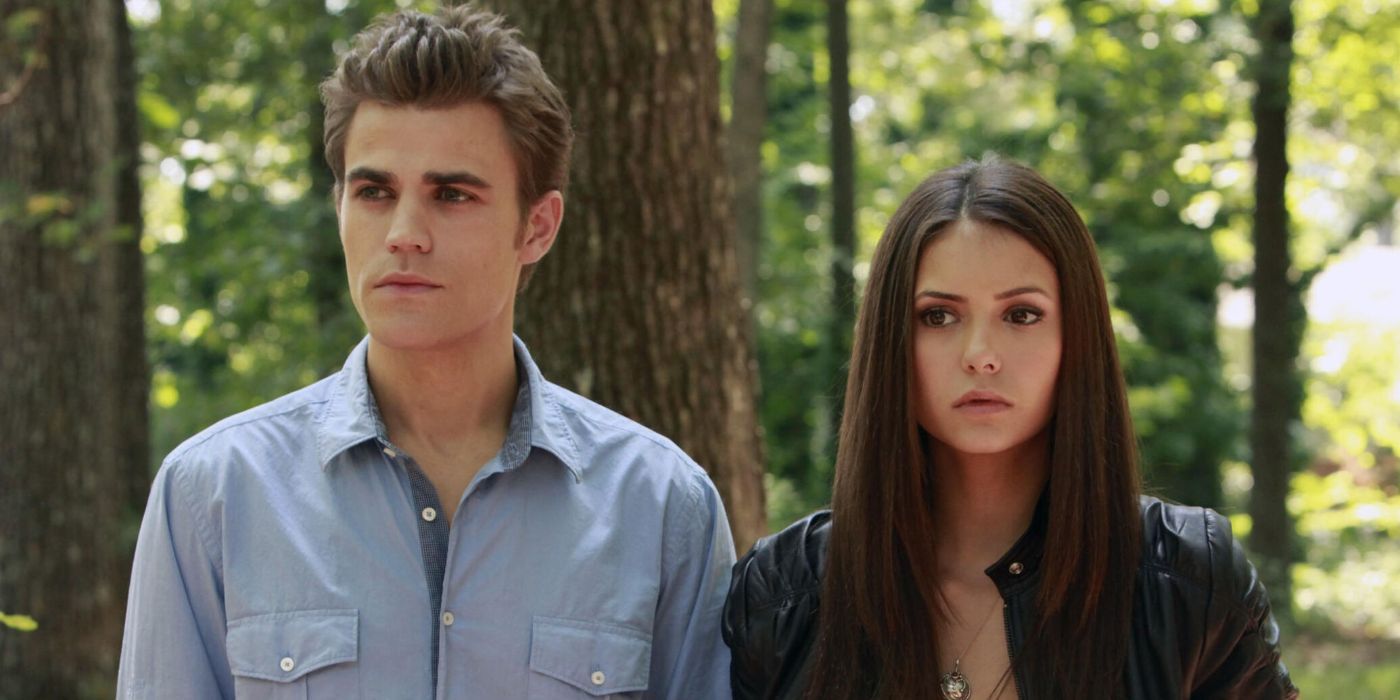 Stefan and Elena standing 