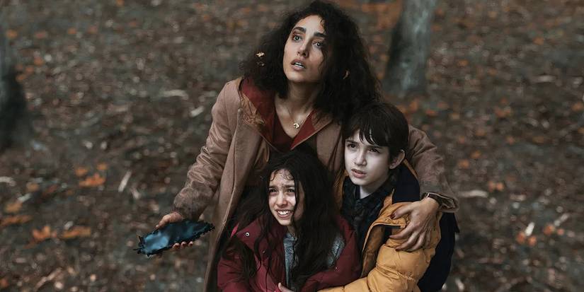 A family clinging to each other in Invasion