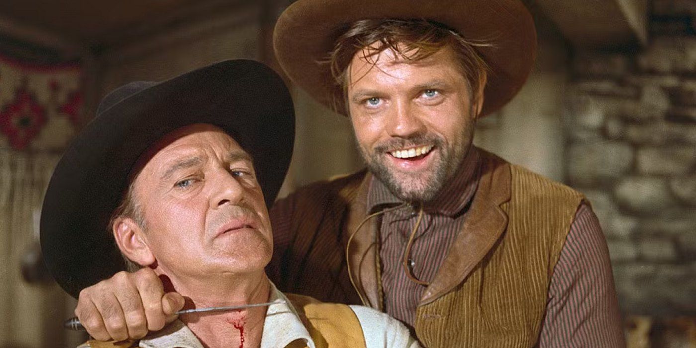 A man holds a knife to Gary Cooper's throat in Man of the West