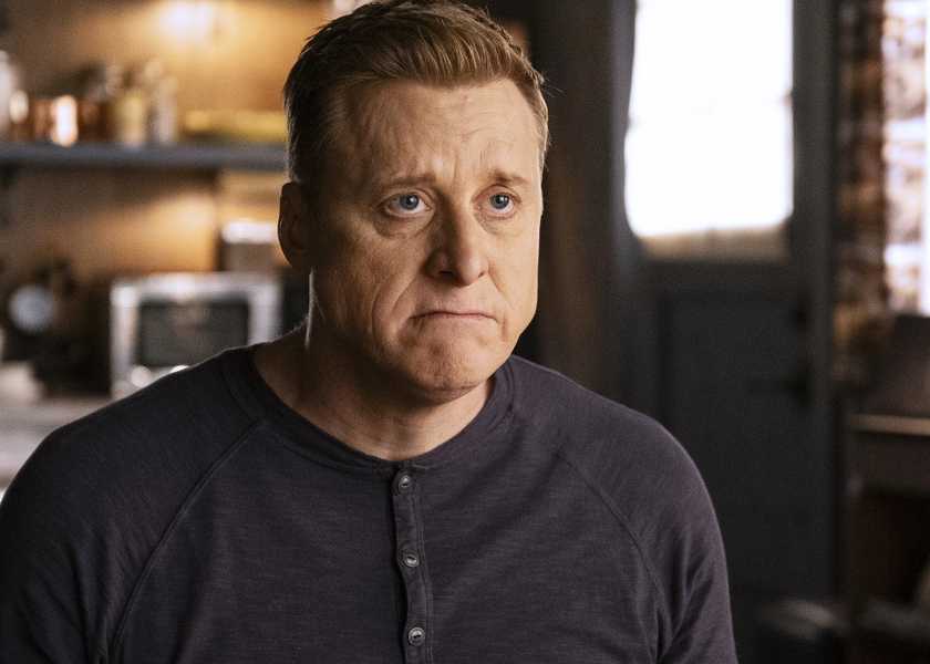 Alan Tudyk as Harry looking sadly in his cabin in Resident Alien