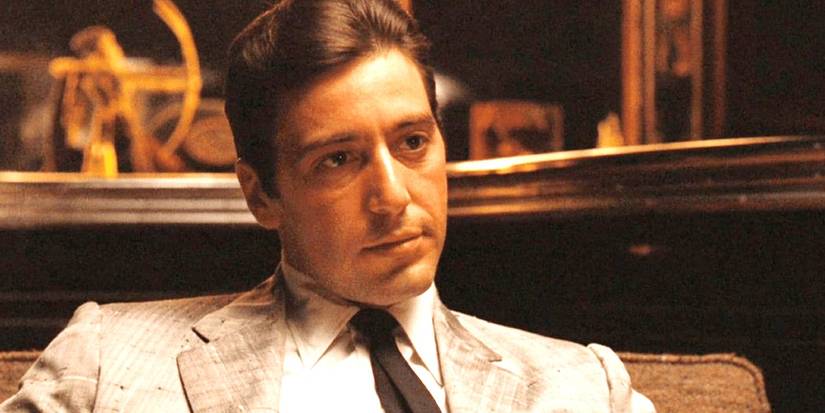 Al Pacino as Michael Corleone in The Godfather looking smug.