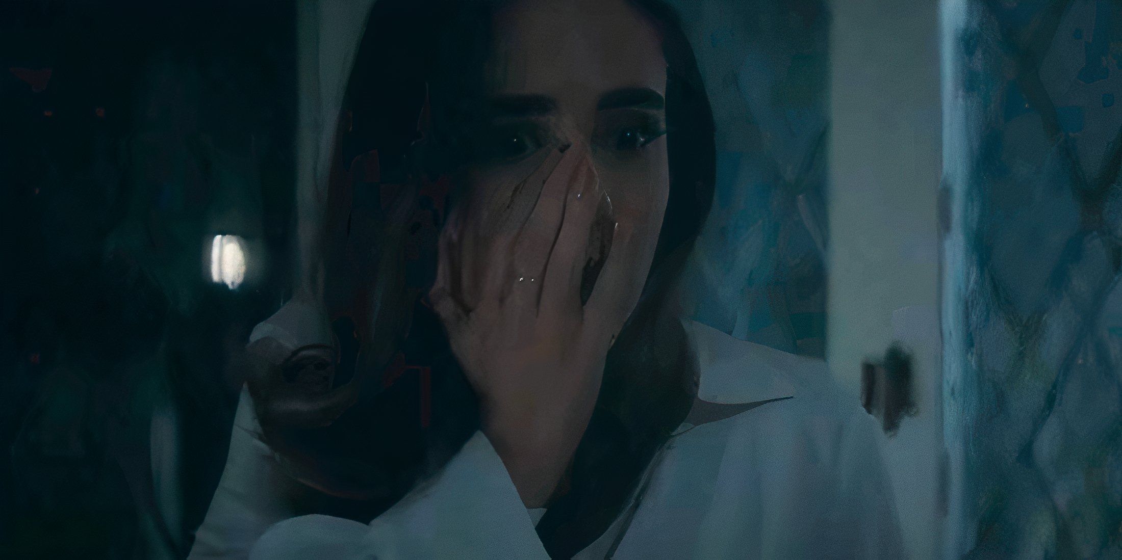 Alicia Sanz as Natalie covering her face with her hand in shock in Push-1