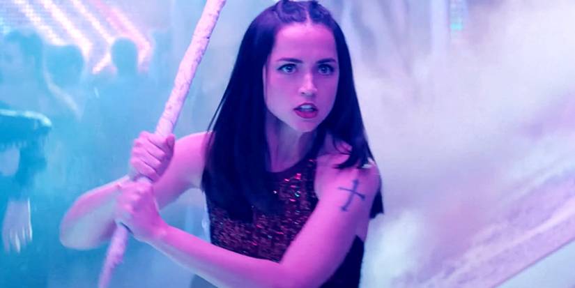 Ana de Armas a Eve holding a pole in Ballerina