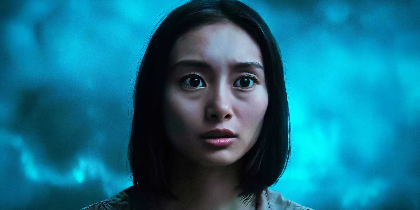 A woman looks unnerved in the Apple TV+ drama Invasion