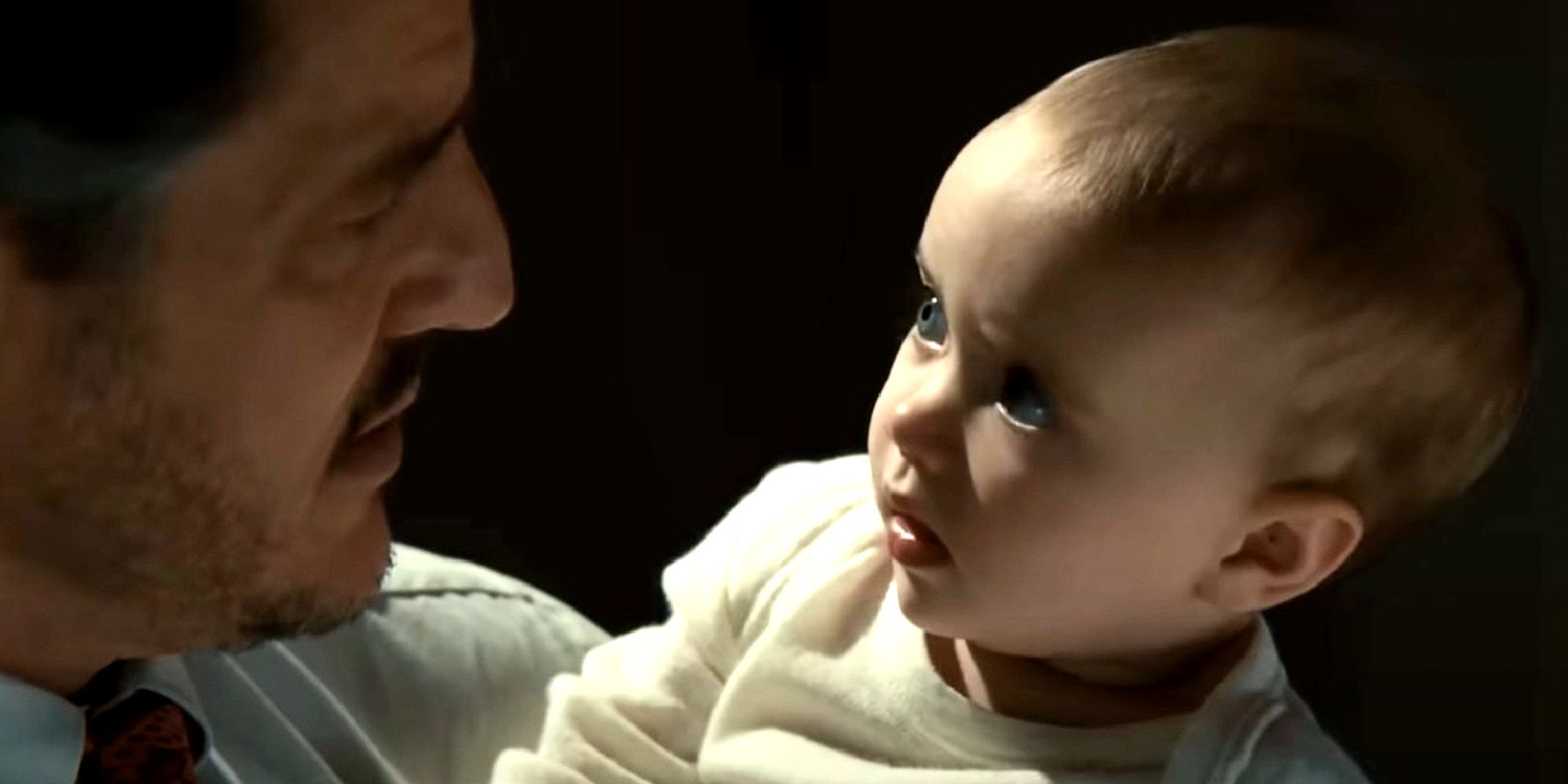 Baby Franklin Richards looks at Reed in The Fantastic Four First Steps
