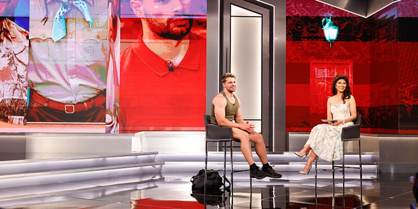 Big Brother's Zae Friedrich sitting on the stage post-eviction with host Julie Chen Moonves.