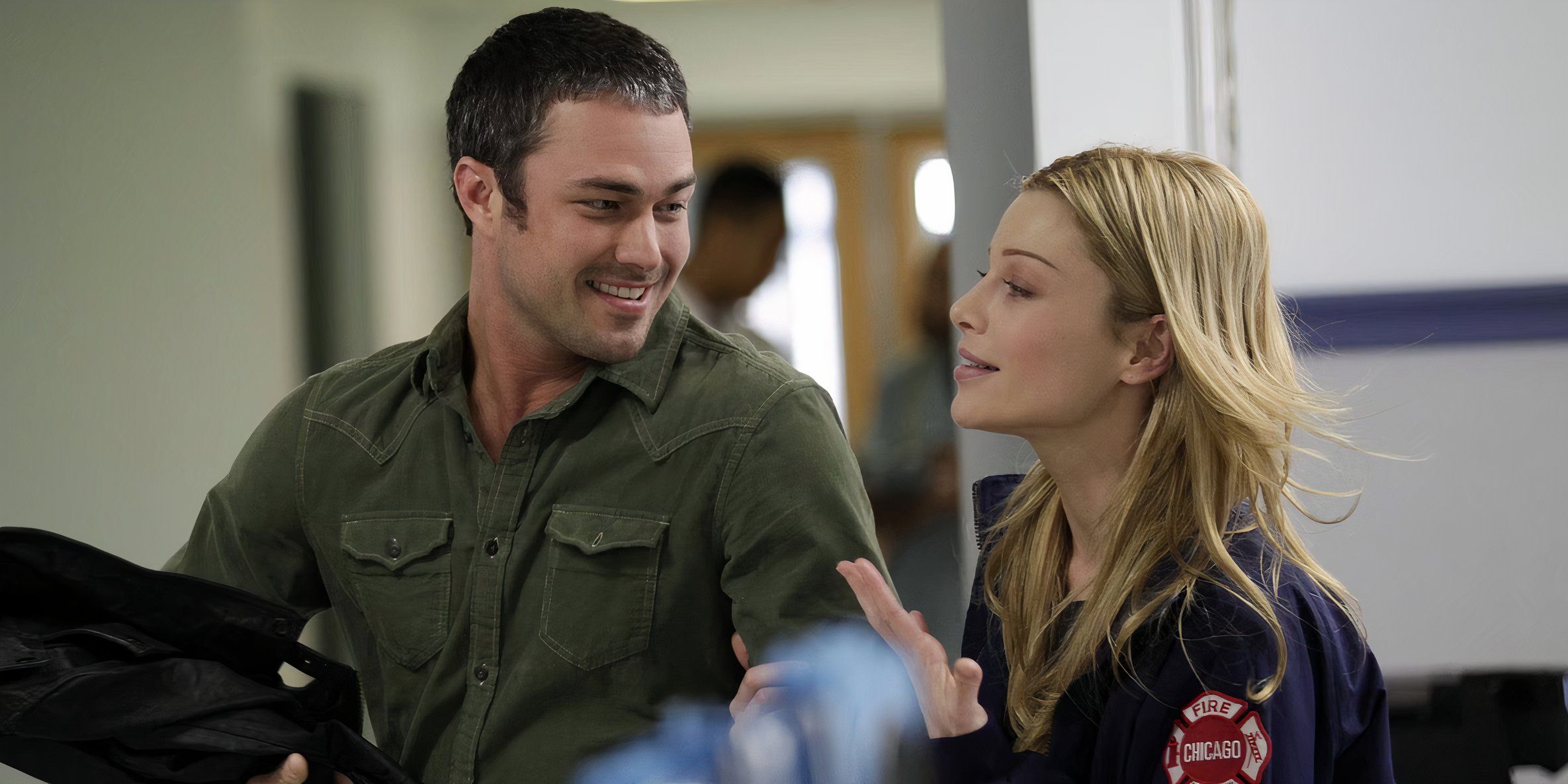 Taylor Kinney as Kelly Severide and Lauren German as Leslie Shay in Chicago Fire