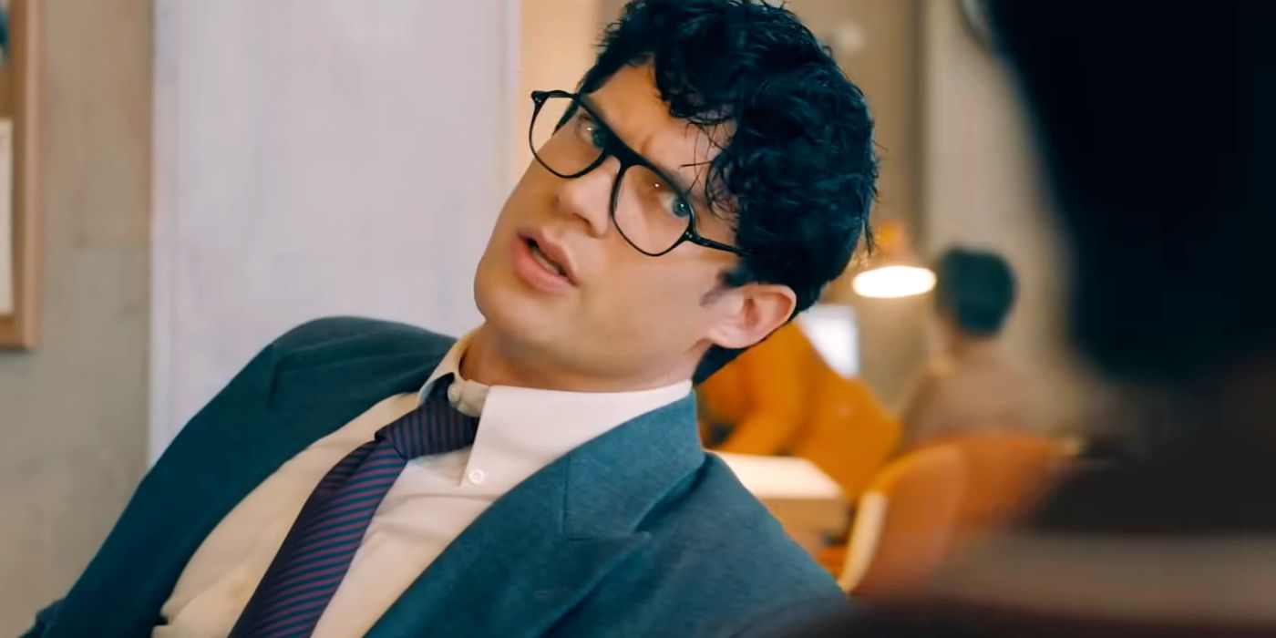 David Corenswet as Clark Kent leaning back in his chair with an incredulous expression in Superman 2025