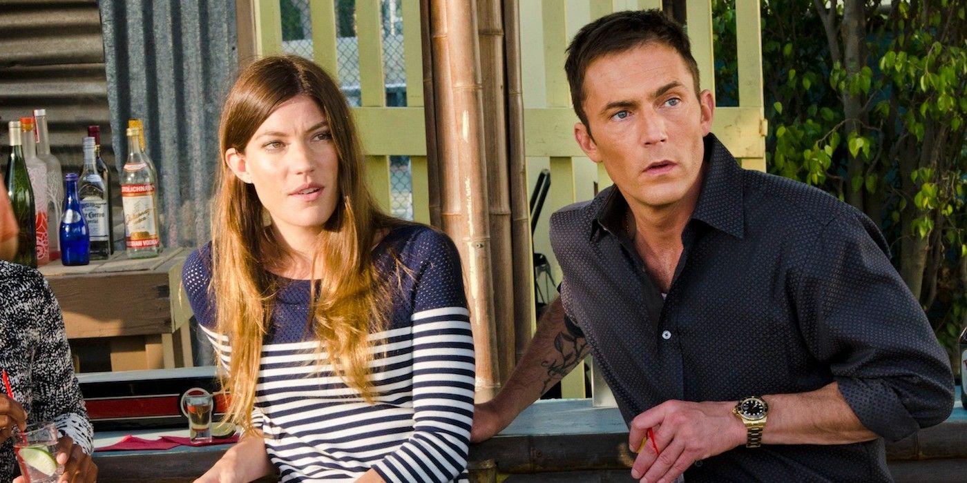 Debra Morgan and Joey Quinn looking at something off-screen in Dexter