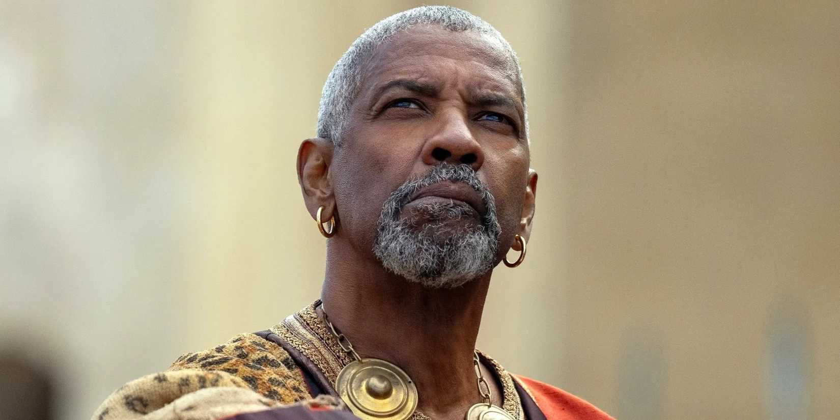 Denzel Washington as Macrinus looking up in Gladiator II