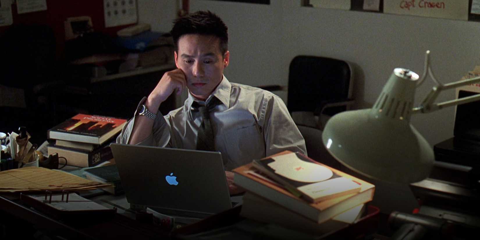 Dr. Huang at his desk using a Mac in Law & Order SVU