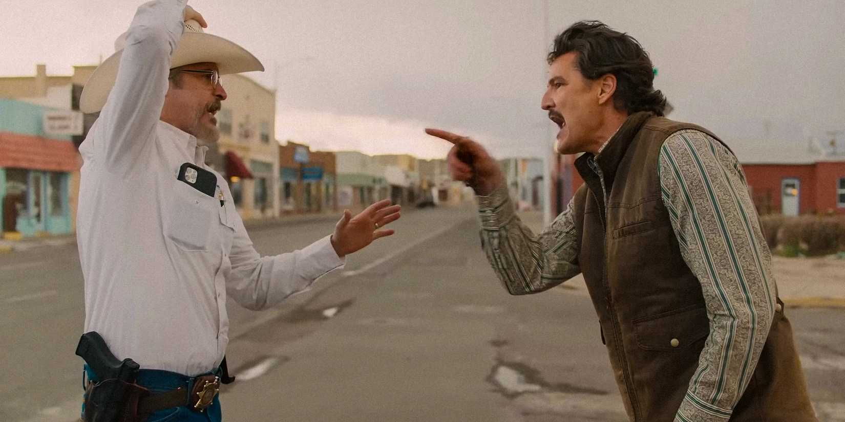 Joaquin Phoenix as Joe Cross and Pedro Pascal as Ted Garcia arguing in Eddington