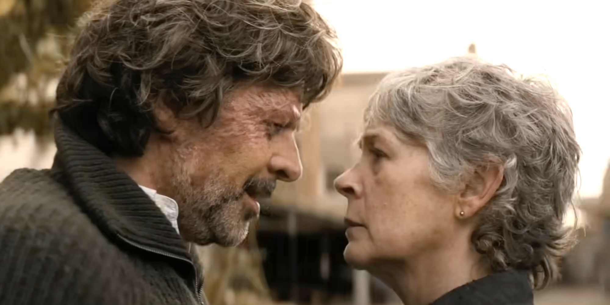 Eduardo Noriega's character and Carol looking into each other's eyes in Daryl Dixon season 3