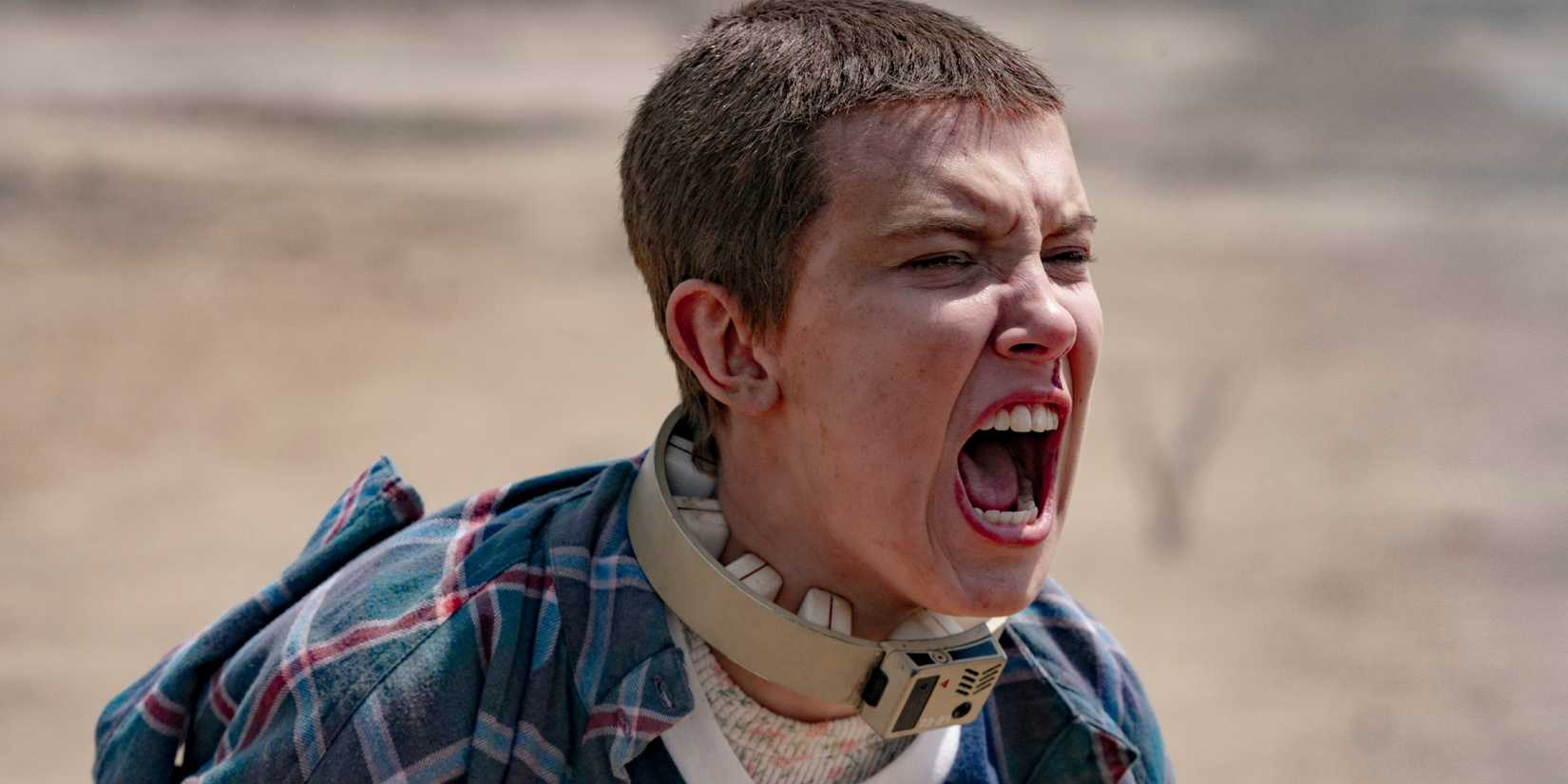Millie Bobby Brown as Eleven screaming while using her powers in Stranger Things