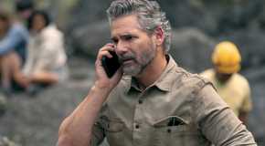 Eric Bana as Kyle Turner on the phone and looking concerned in Netflix's Untamed