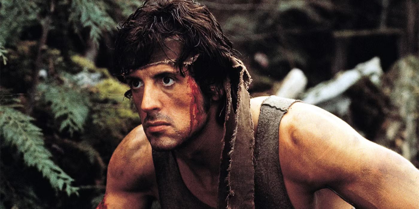 Sylvester Stallone staring ahead intensely in First Blood