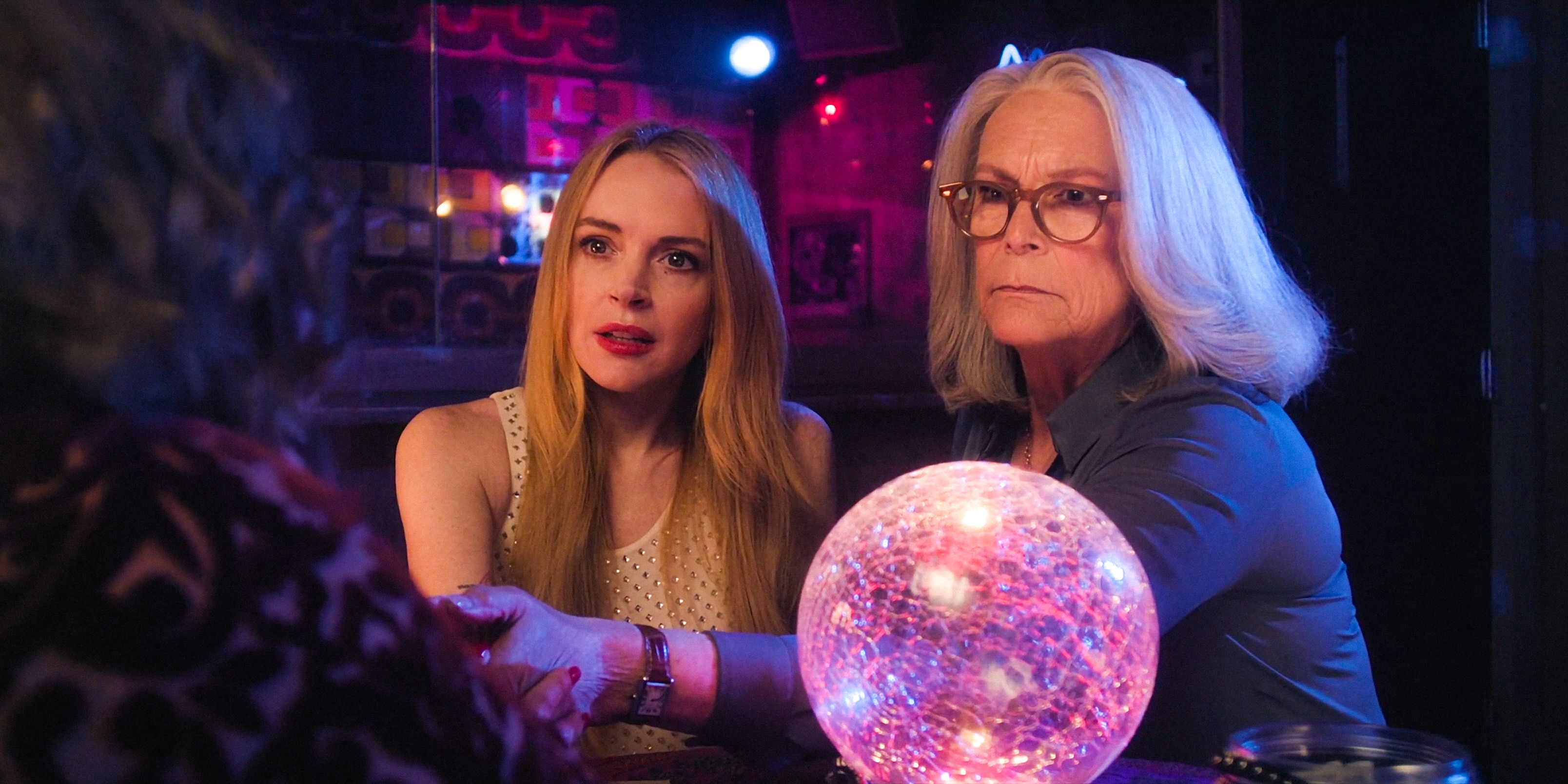 Anna (Lindsay Lohan) and Tess (Jamie Lee Curtis) looking concerned in Freakier Friday (2025)
