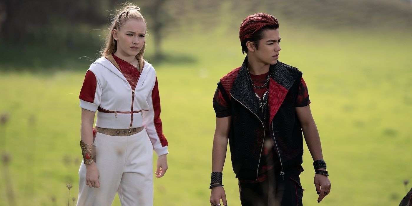Freya Skye as Nova and Malachi Barton as Victor standing on a hillside in Zombies 4: Dawn of the Vampires