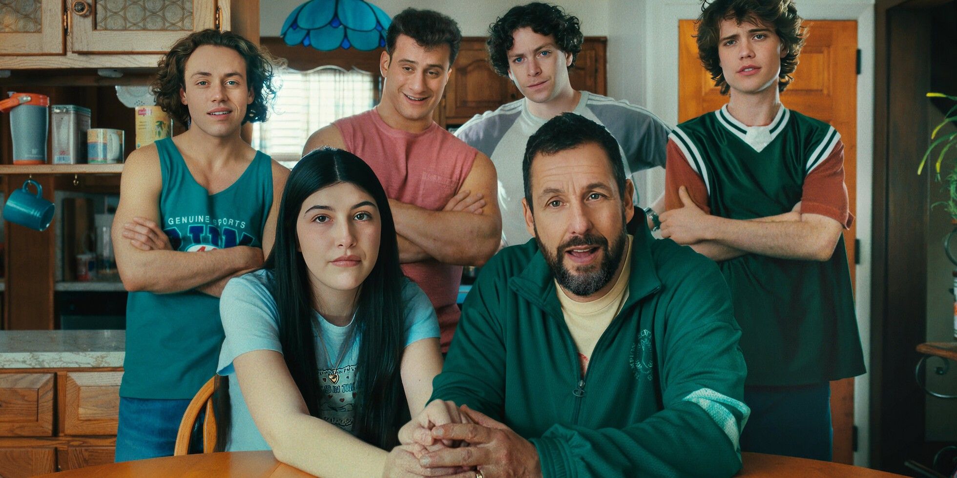 Happy Gilmore sitting at a kitchen table surrounded by his kids in Happy Gilmore 2