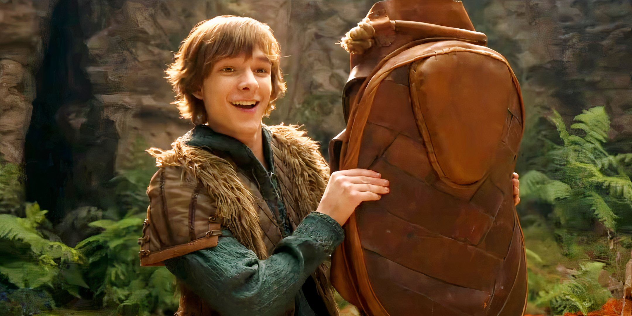 Hiccup Holding a Saddle for Toothless in the Live Action How to Train Your Dragon