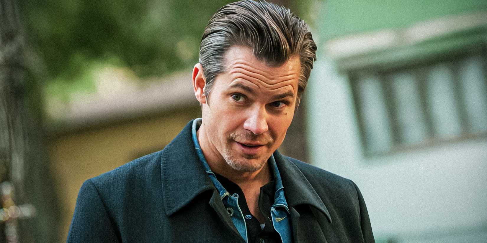 Raylan Givens (Timothy Olyphant) smirking in Justified.