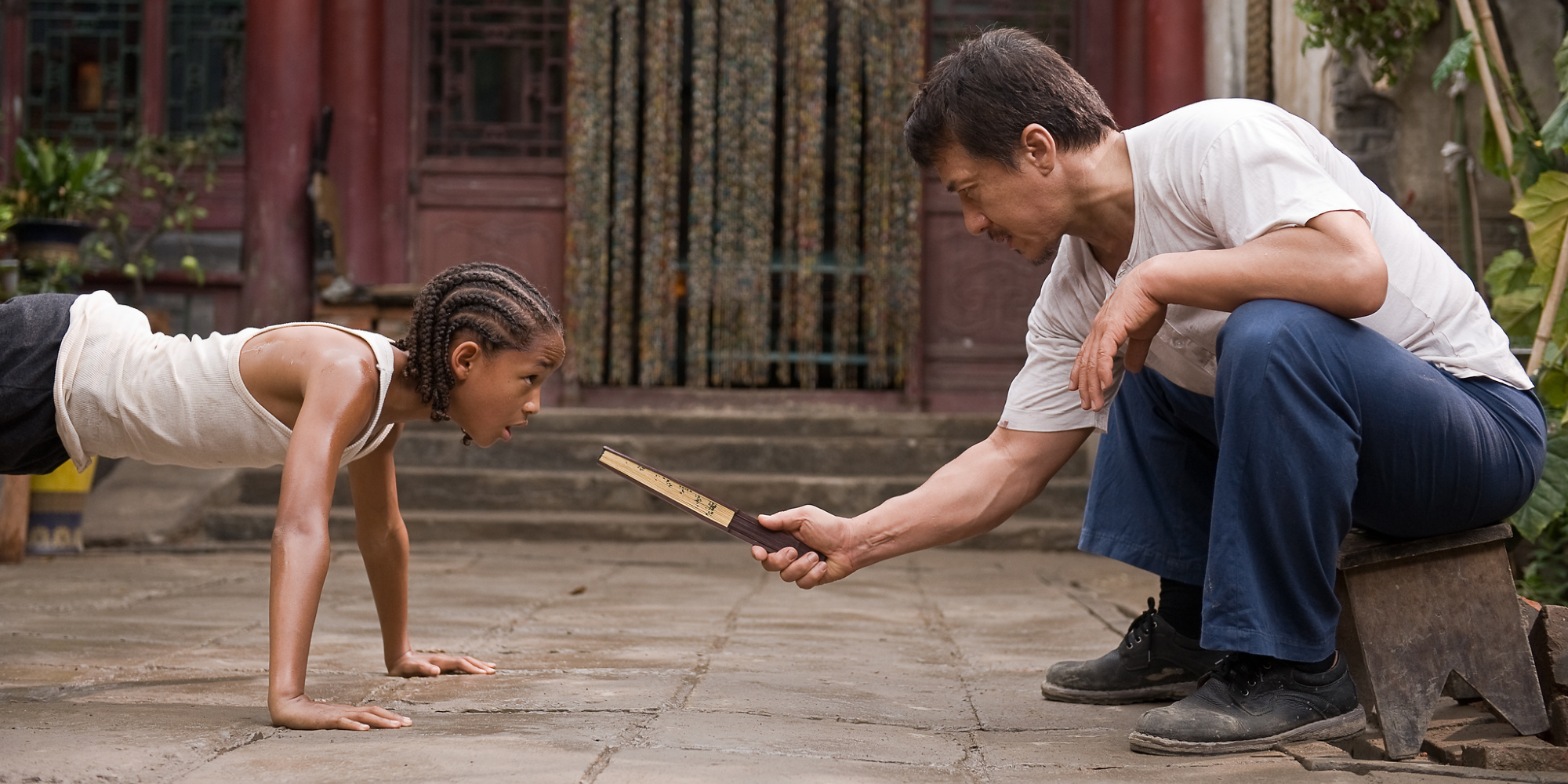 Jaden Smith as Dre and Jackie Chan as Mr. Han in The Karate Kid