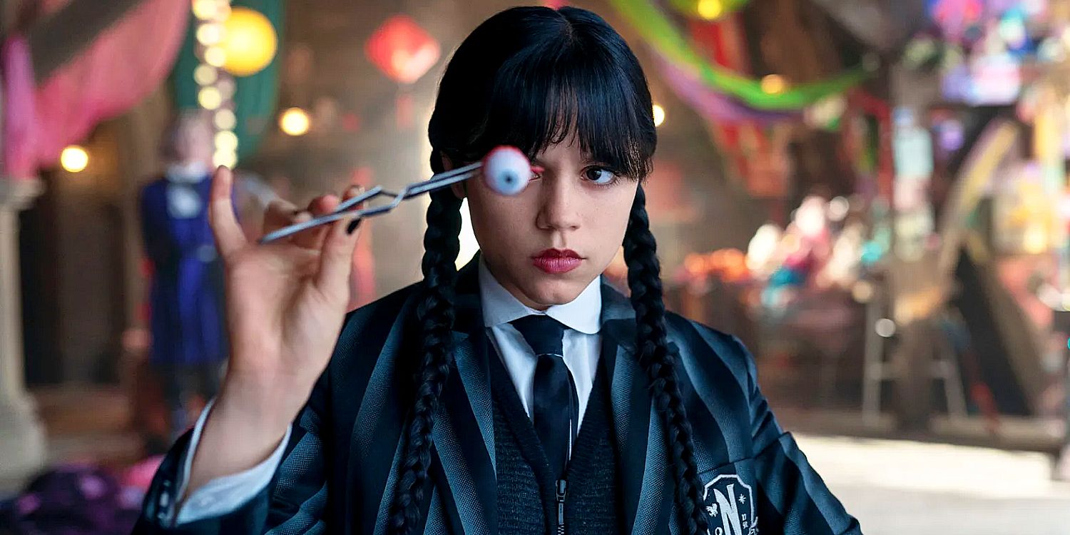 Jenna Ortega's Wednesday holding up an eyeball in season 2
