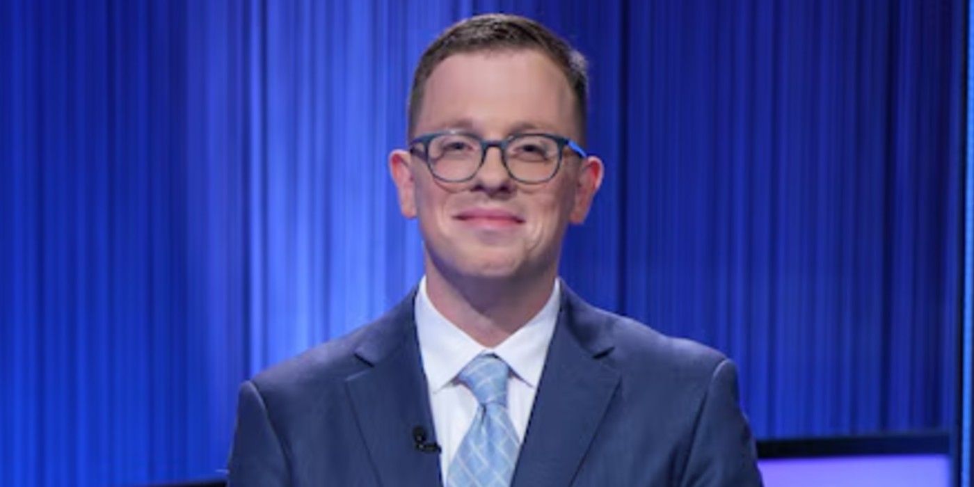 Jeopardy Champion Jonathan Hugendubler Smiling At Podium