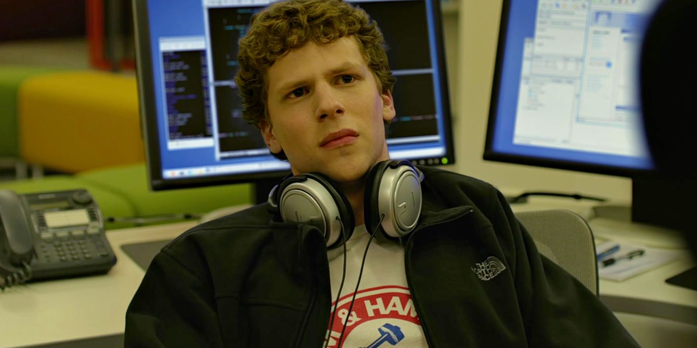 Jesse Eisenberg as Mark Zuckerberg leaning back and looking upset in The Social Network