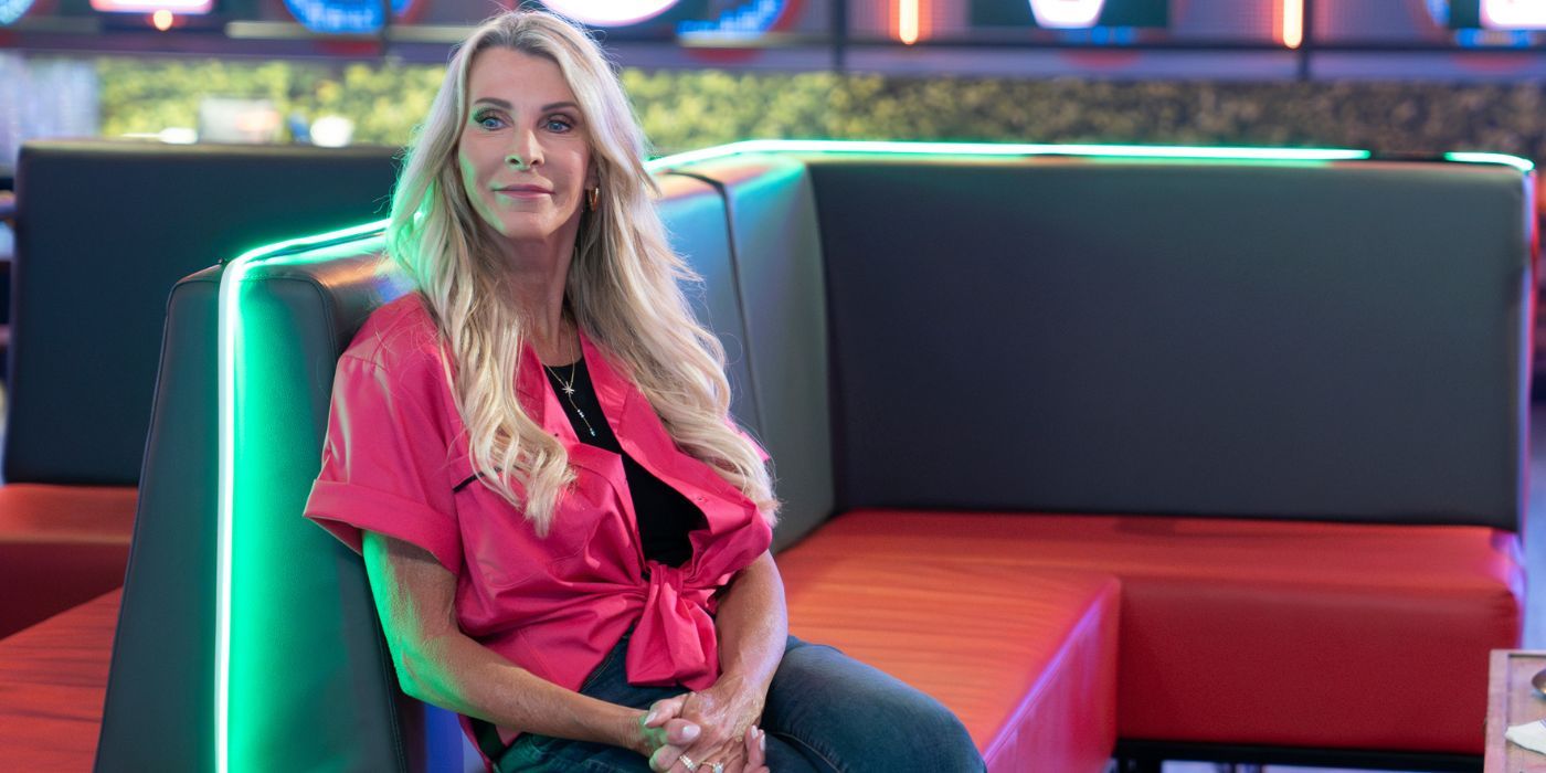 The Golden Bachelorette's Joan Vassos sitting alone