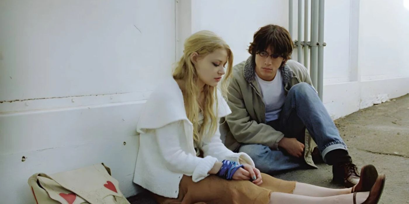 Joseph Gordon-Levitt as Brendan Frye sitting with Emilie de Ravin as Emily Kostich in Brick