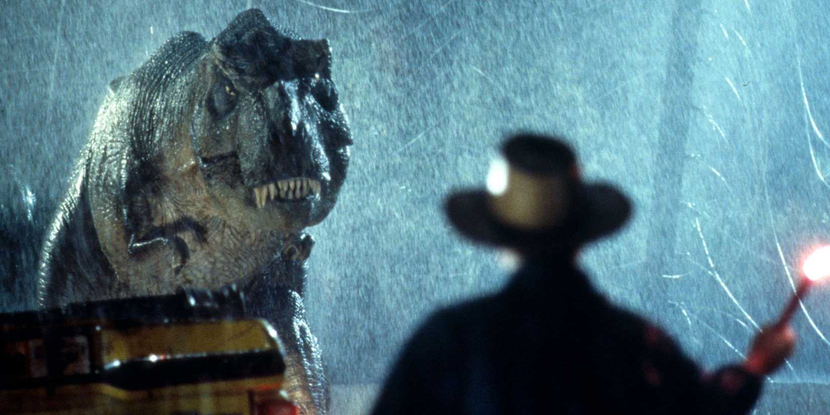 Jurassic Park still with Dr. Grant facing a T-Rex