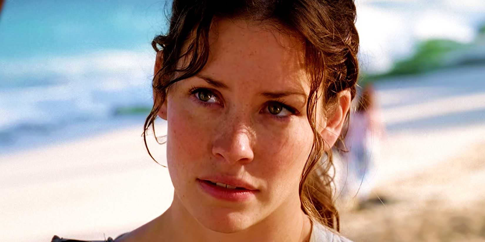 Kate looking up in Lost with a serious expression on her face