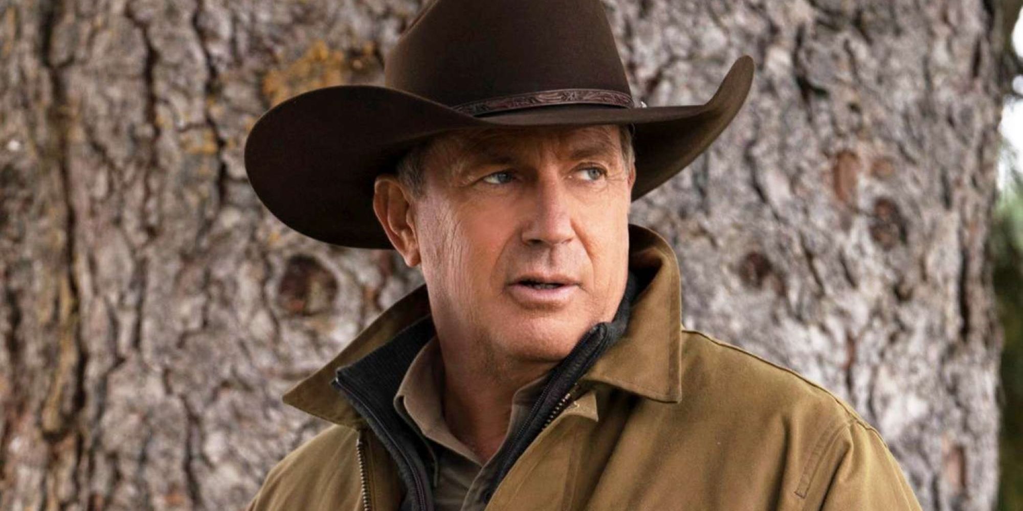Kevin Costner looking off into the distance in Yellowstone