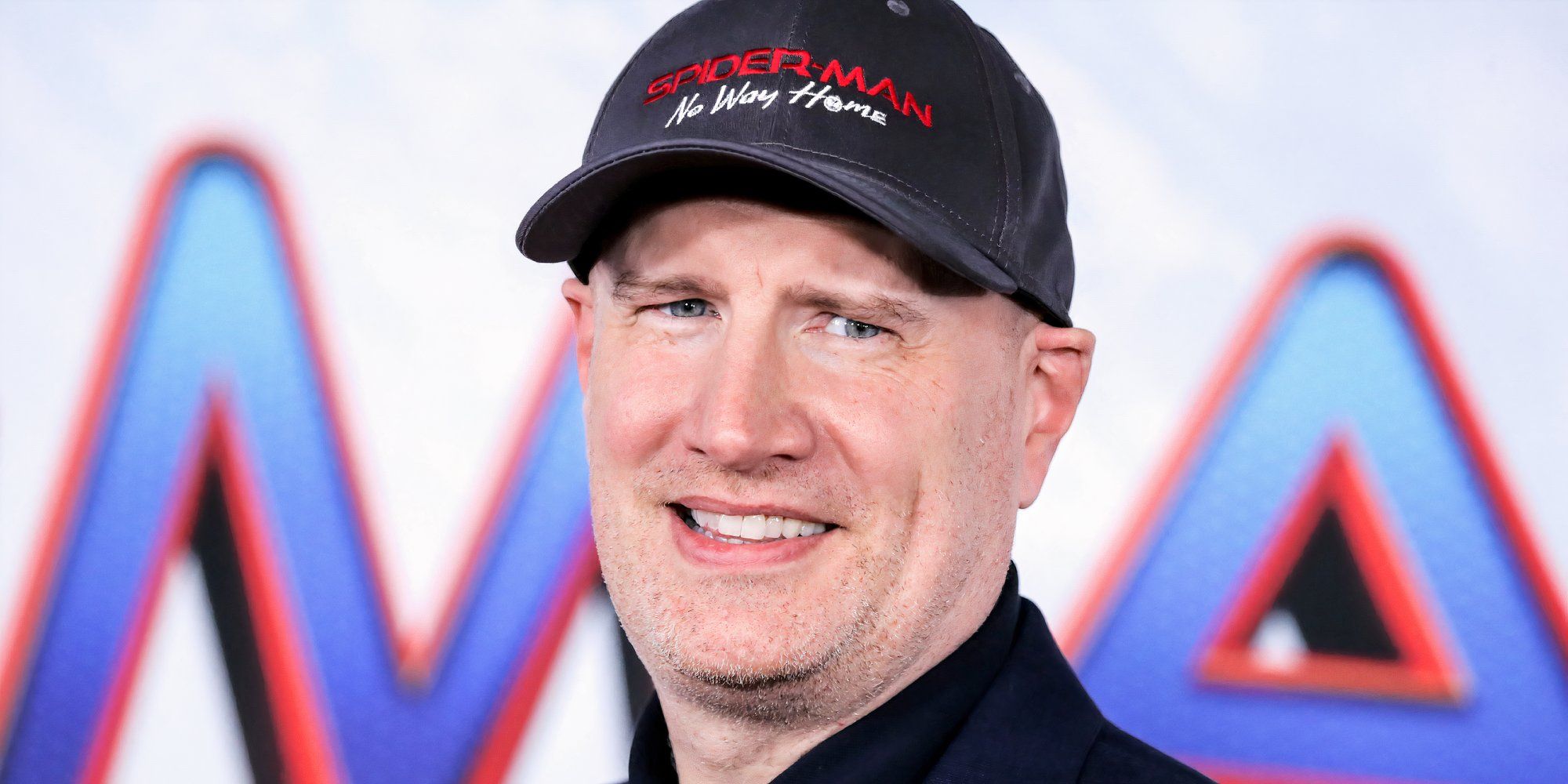 Kevin Feige smiling and wearing a themed hat at the premiere of Spider-Man: No Way Home (2021)