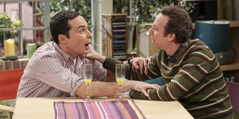 Stuart & Sheldon making faces as they stare at each other in The Big Bang Theory