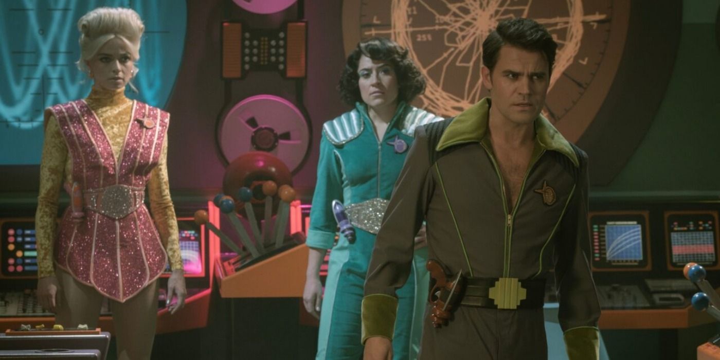 Kirk, Chapel, & Ortegas in retro Star Trek costumes in Strange New Worlds Space Adventure Hour