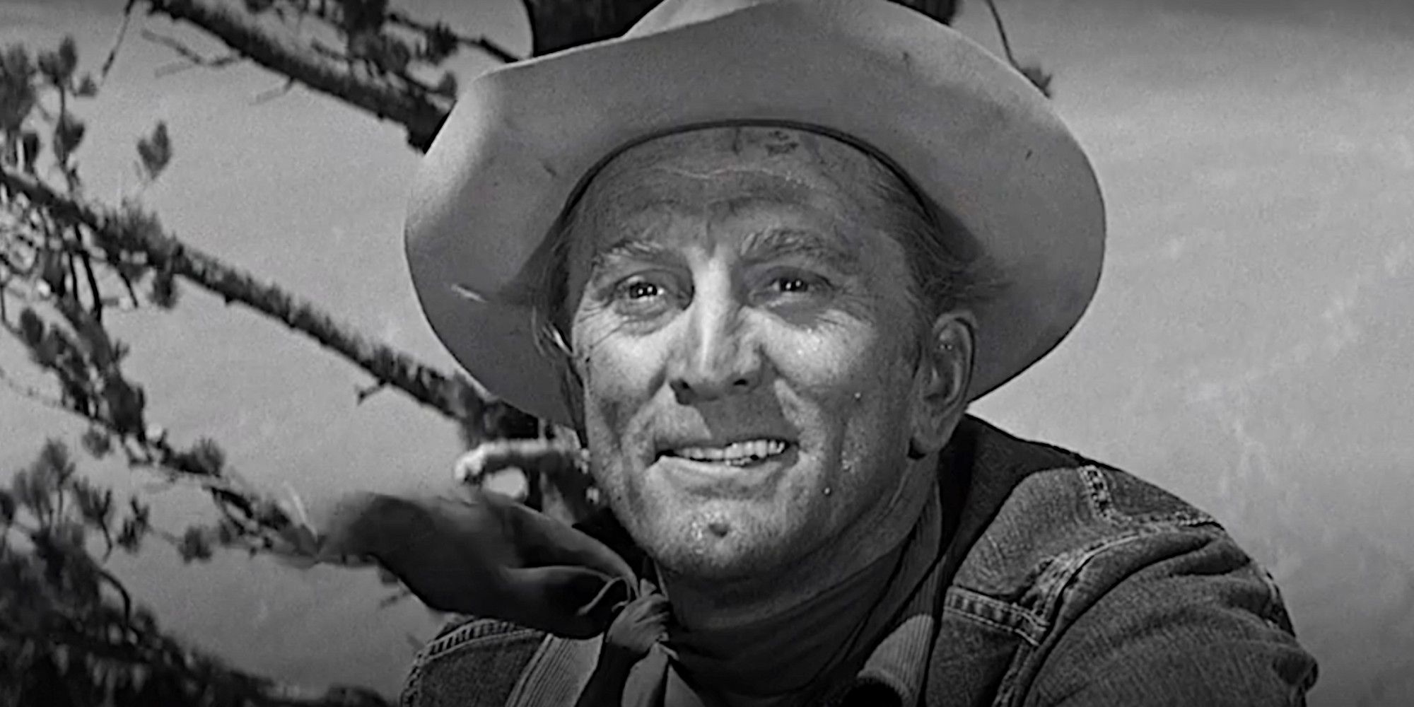 Kirk Douglas wears a crooked smile in a scene from Lonely Are The Brave