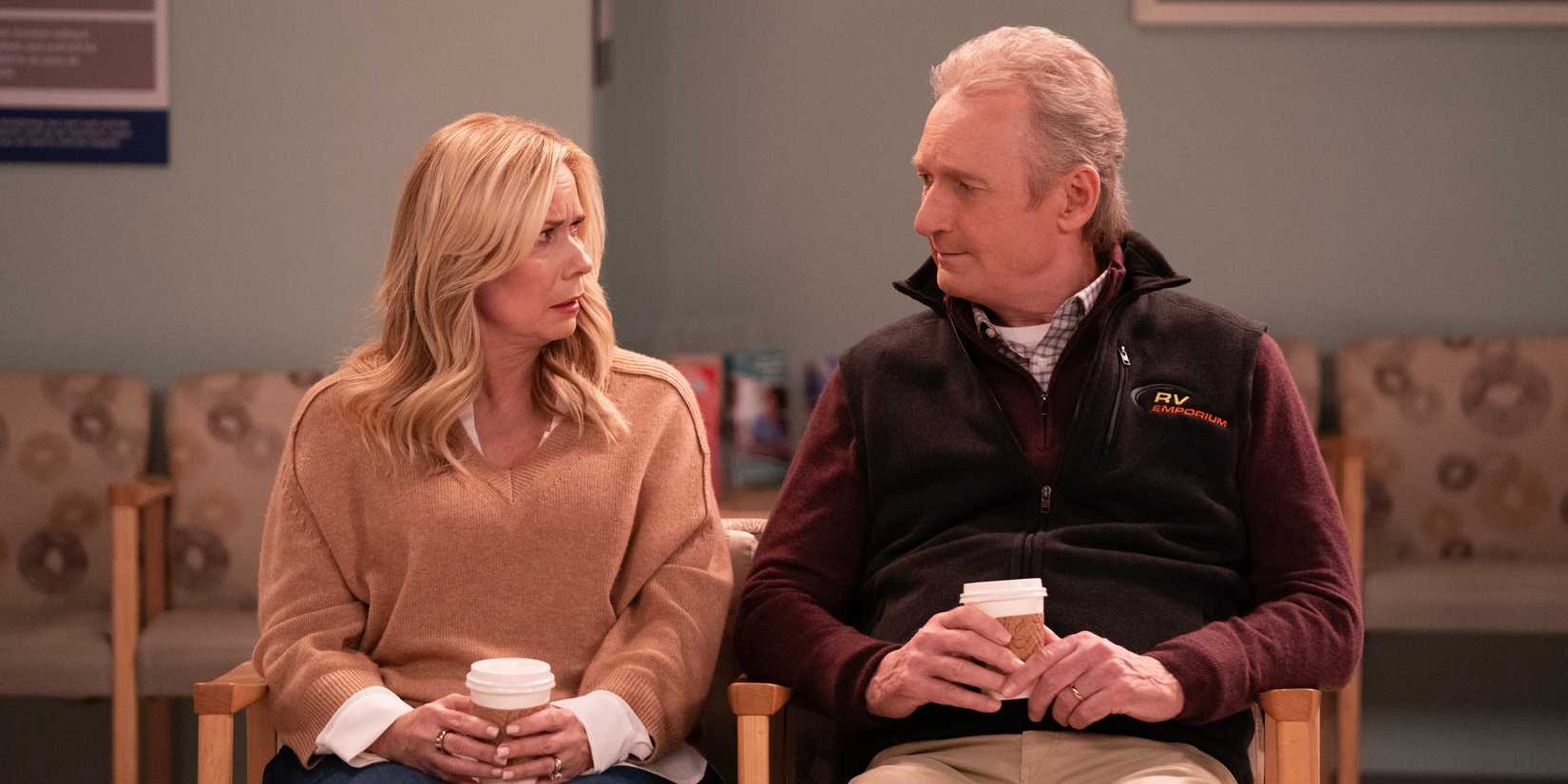 Leanne and her husband sitting with coffee cups in Netflix's Leanne