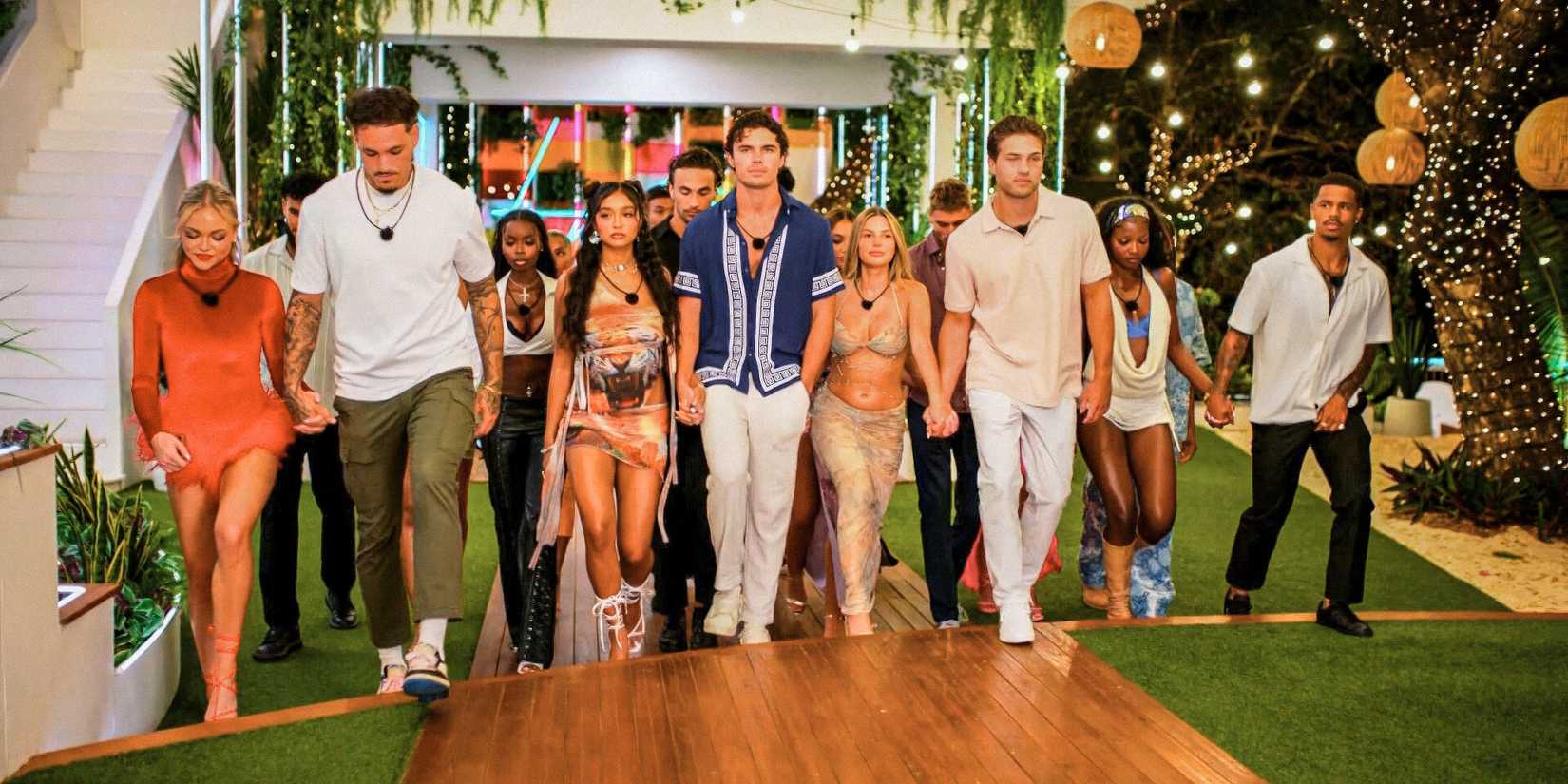 Love Island USA season 7 couples walking while holding hands paired up