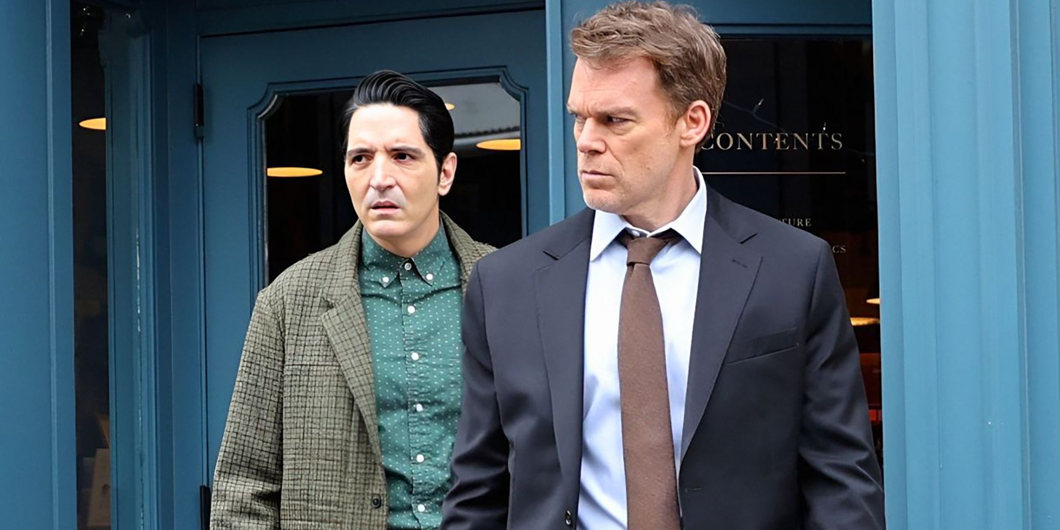 Michael C. Hall's Dexter looking suspicious while David Dastmalchian's Gareth stands behind him in Dexter: Resurrection