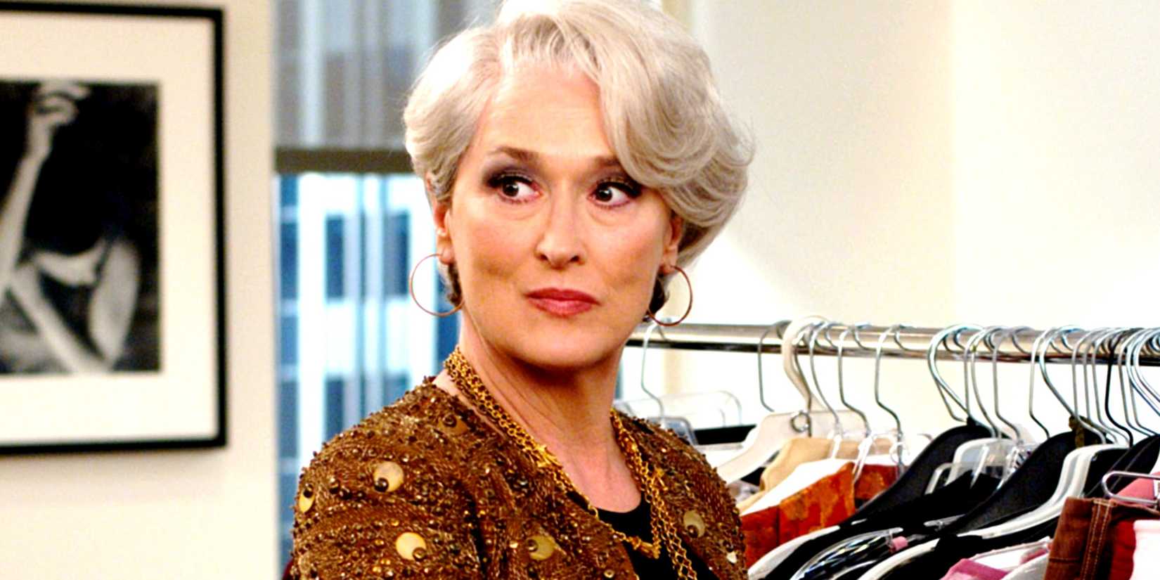 Miranda looking to the side with pursed lips in The Devil Wears Prada