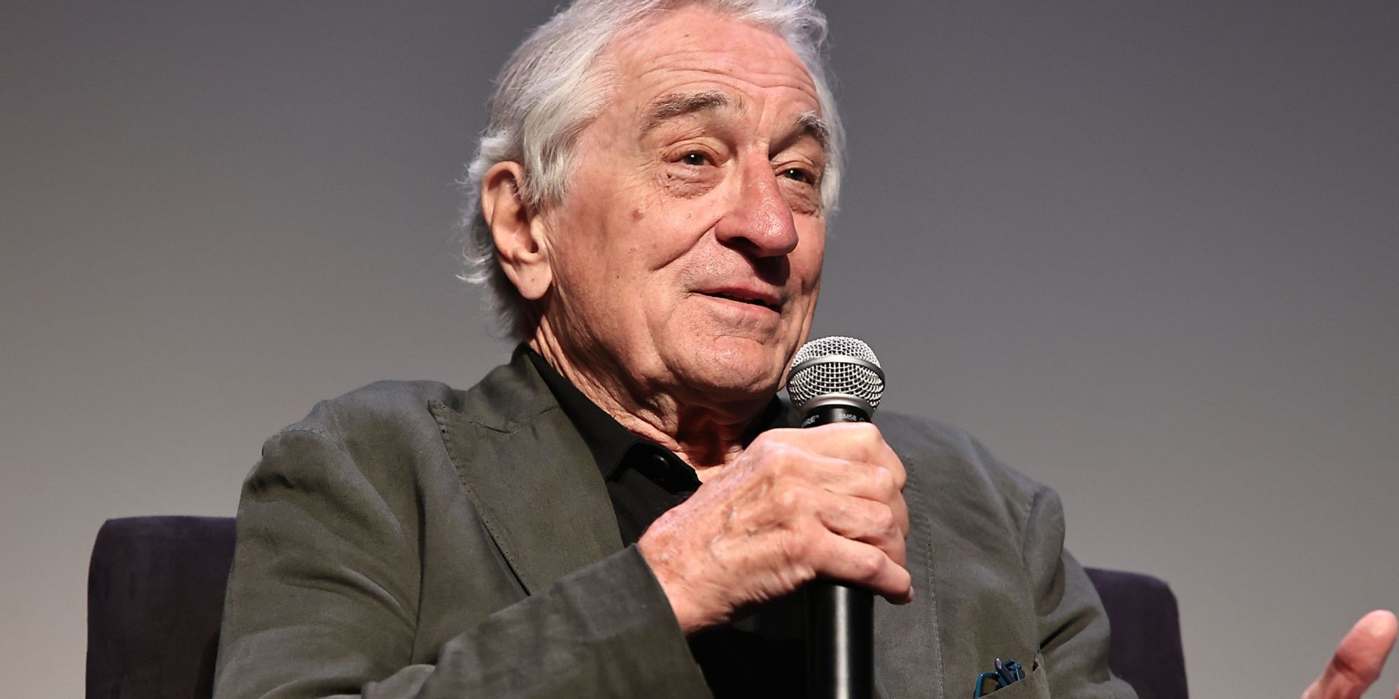 Robert De Niro talking at a conference