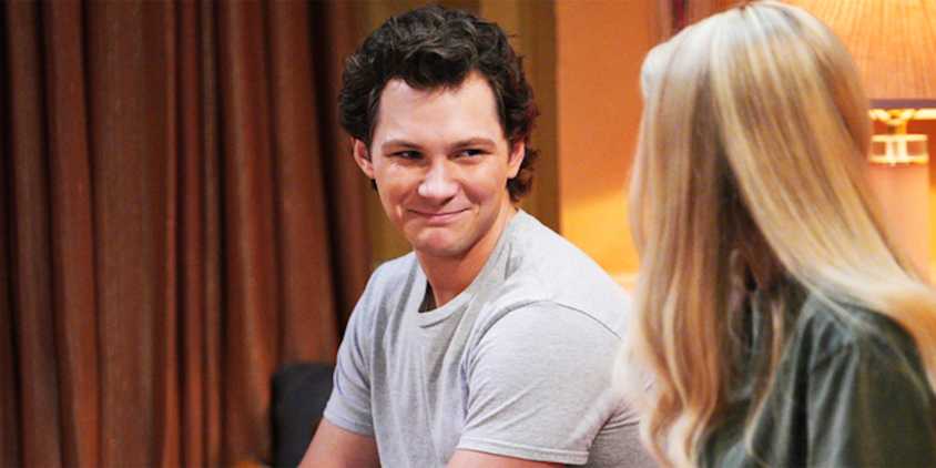 Montana Jordan's Georgie smiling while sitting on a bed in Georgie and Mandy's First Marriage