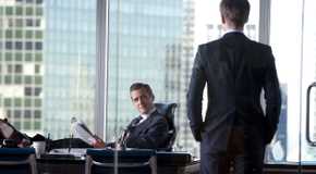 Harvey sitting in his office while Mike talks to him